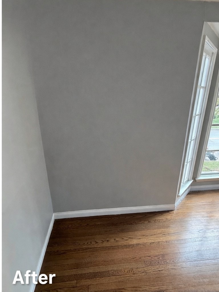 Wall after drywall repair by Bravo's Painting